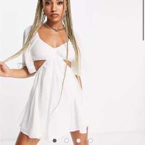 ASOS DESIGN plunge cut out side mini skater sundress with tie details in white